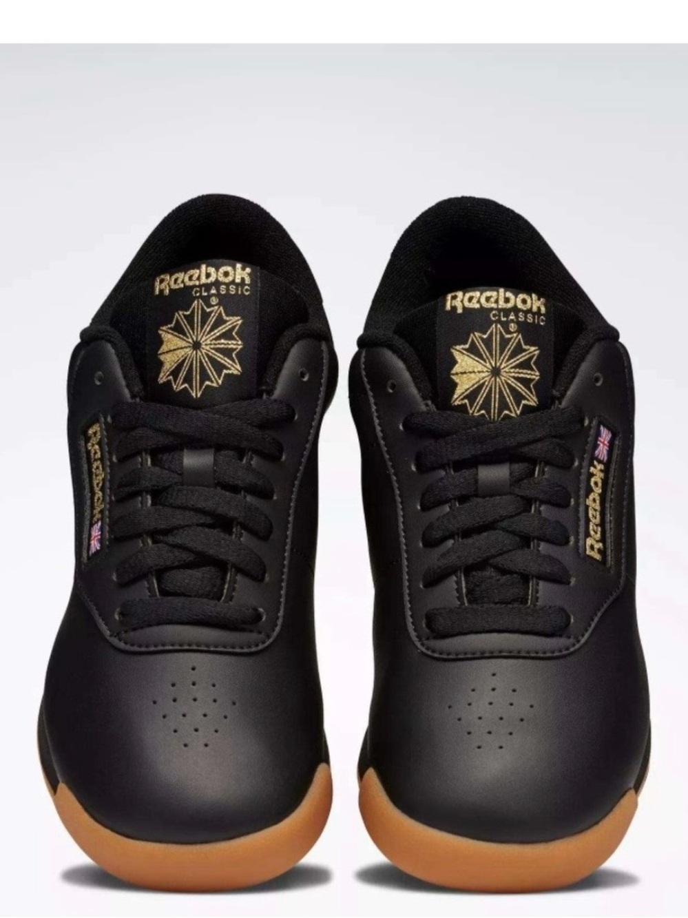 Reebok Princess Women’s Sneaker in Black with Gold Accents; NWOB, Sz. 8.5